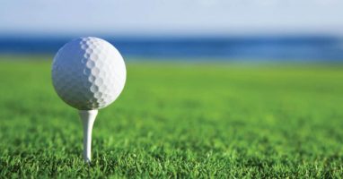 Golf ball on a golf tee