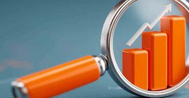 Magnifying glass and bar chart